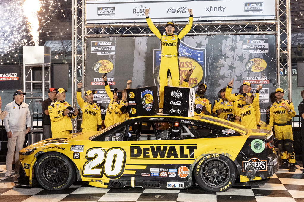 Christopher Bell celebrates winning a NASCAR Cup Series auto race.