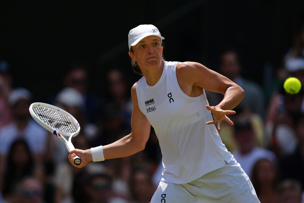 Iga Swiatek plays a return during the third round vs. Alexandra Eala at the Wimbledon.