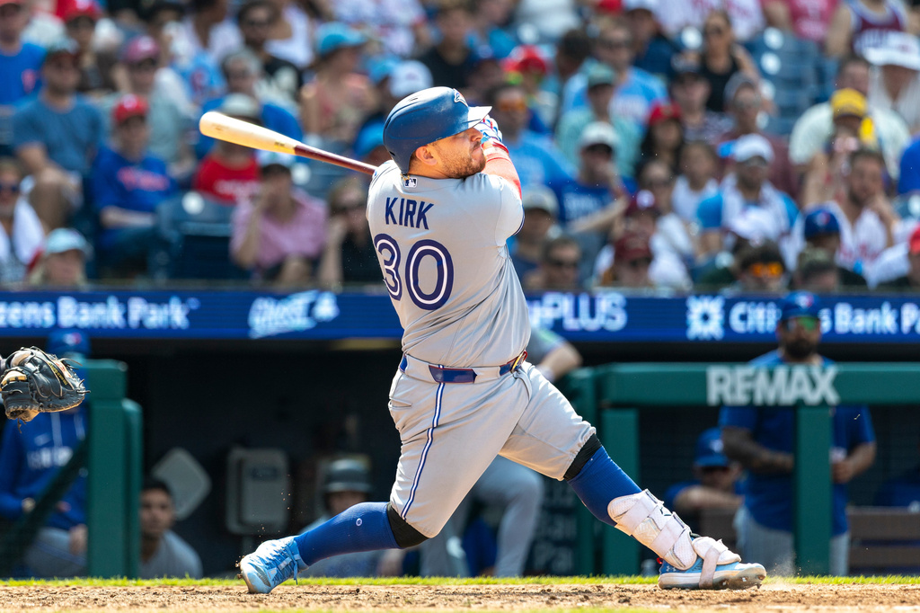 Toronto Blue Jays C Alejandro Kirk takes a swing during an MLB game against the Philadelphia Phillies.