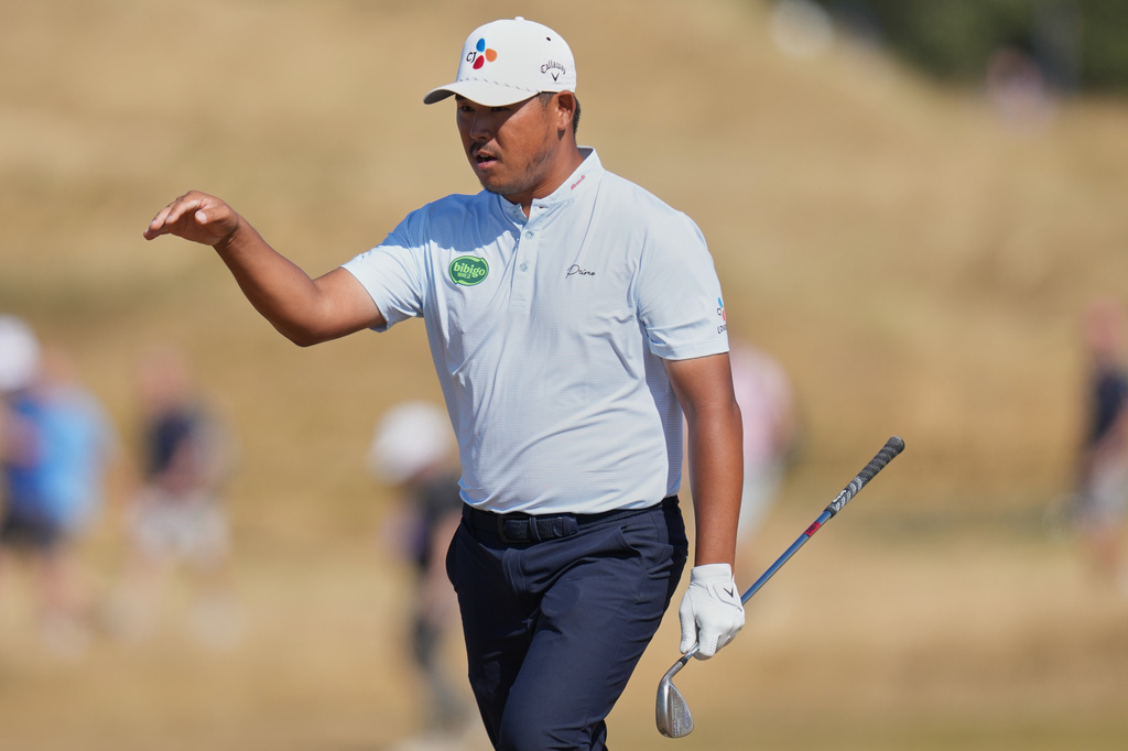 PGA Tour star Si Woo Kim reacts during the British Open golf tournament.