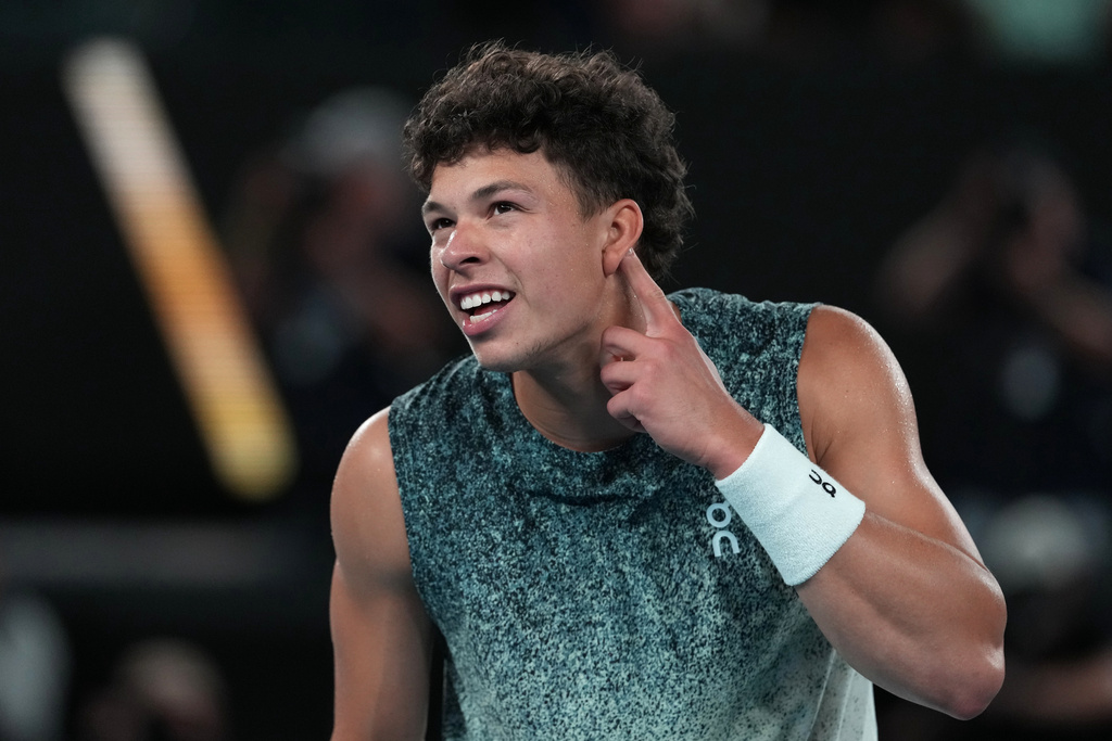 Ben Shelton of the U.S. celebrates after defeating Casper Ruud of Norway during their fourth round match at the Australian Open tennis championship in Melbourne, Australia, Monday, Jan. 26, 2026.