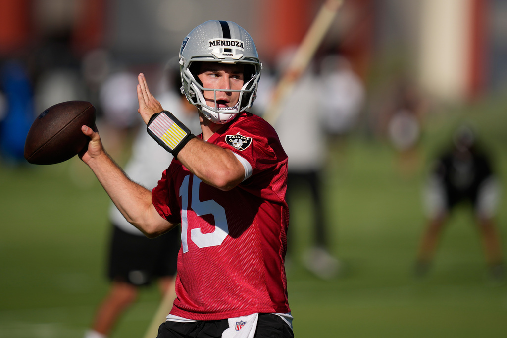 Raiders QB Fernando Mendoza throws during the team's practice.