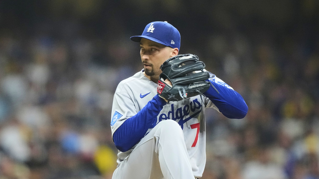 Dodgers SP Blake Snell throws during the seventh inning against the Brewers.