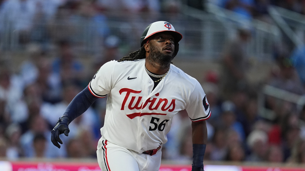 Minnesota Twins DH Josh Bell hits a ground-rule double against the Atlanta Braves.