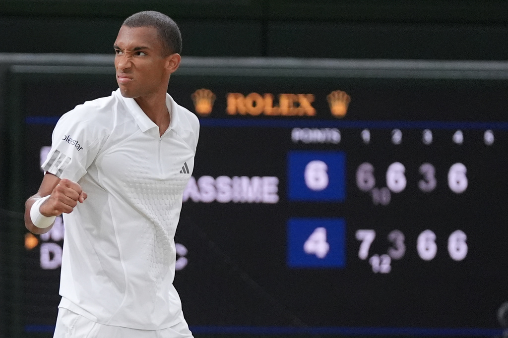 Tennis star Felix Auger-Aliassime celebrates during the Wimbledon Tennis Championship.