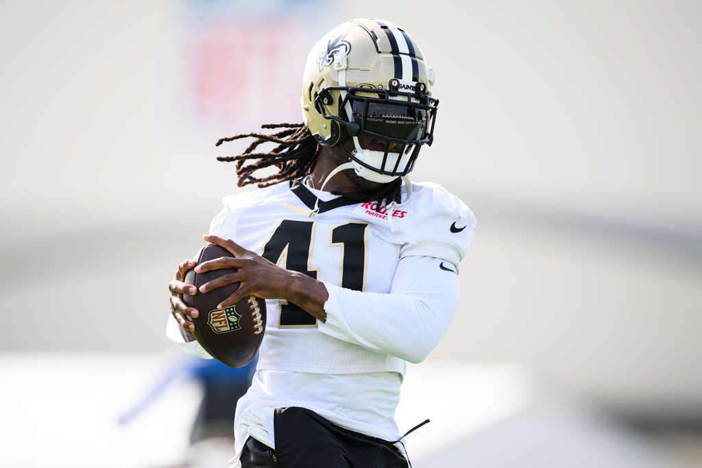 Saints RB Alvin Kamara catches the ball during practice at training camp.