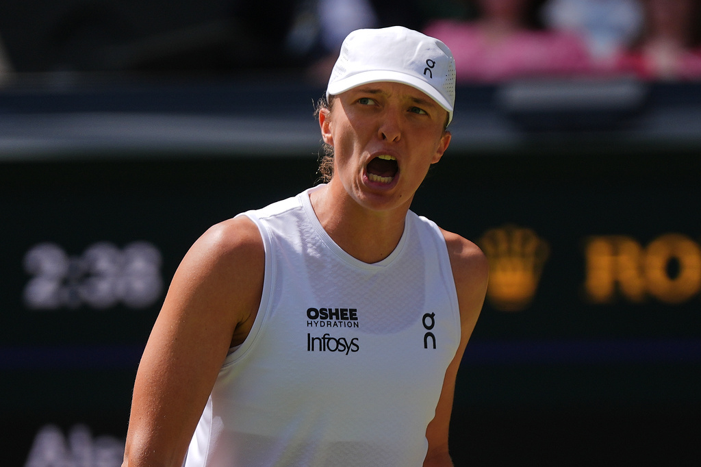 Tennis star Iga Swiatek reacts during a match against Alexandra Eala at the Wimbledon.