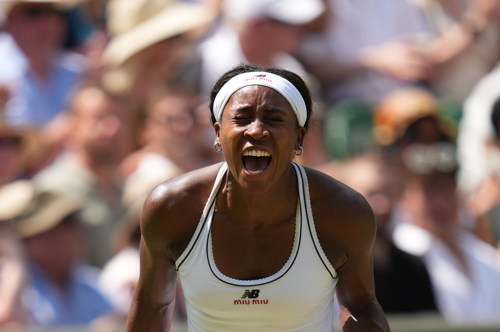 Coco Gauff reacts after winning a game against Karolina Muchova in a semifinal match at the Wimbledon.