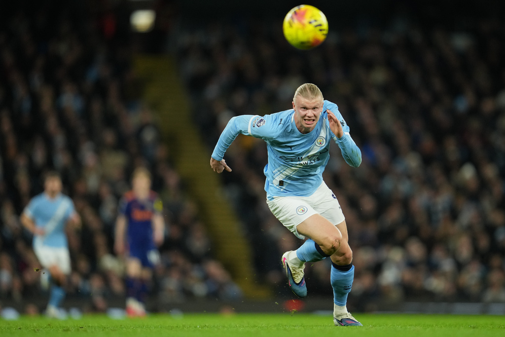 Manchester City ST Erling Haaland runs for the ball during an EPL match vs. Newcastle.