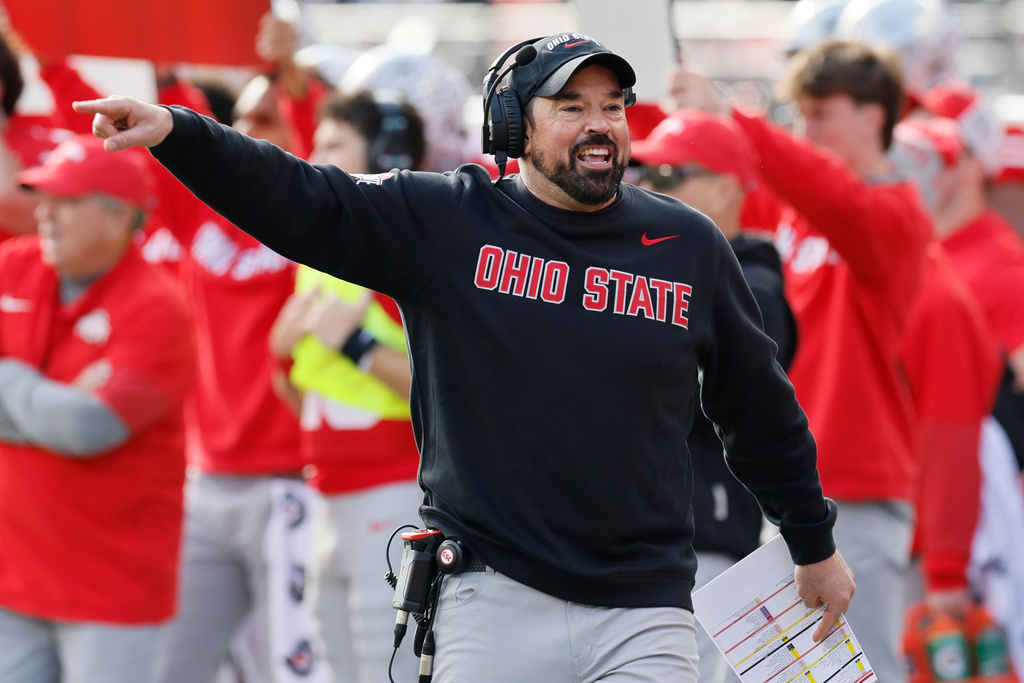 Ohio State Buckeyes HC Ryan Day gestures during a CFB game against the Rutgers Scarlet Knights.