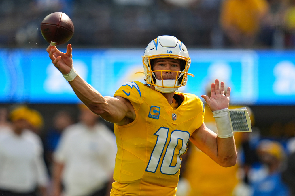 Chargers QB Justin Herbert attempts a throw during a game vs. the Colts.