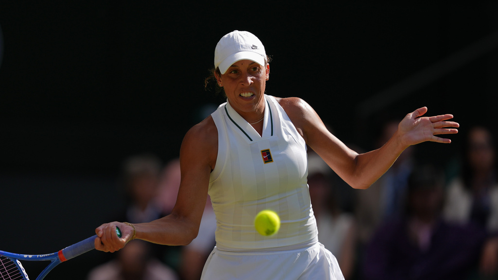 Tennis star Madison Keys plays a return during the Wimbledon Tennis Championship.