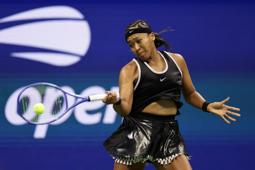 Naomi Osaka, of Japan, returns the ball to Anastasia Zakharova, of Russia, during the first round of the U.S. Open tennis championships Monday, Aug. 31, 2026, in New York.