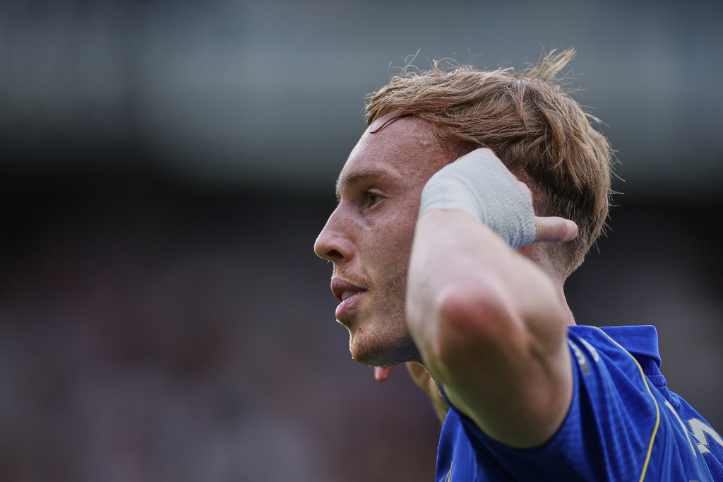 Chelsea's Cole Palmer gestures after a goal during a Premier League match.