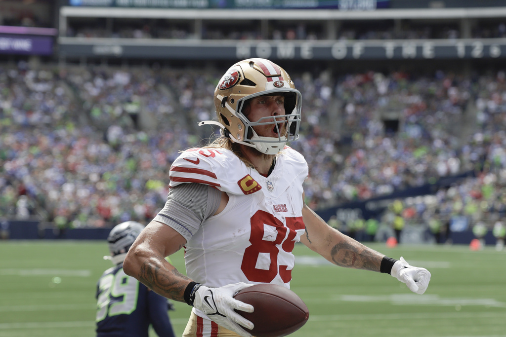 49ers TE George Kittle celebrates after scoring a touchdown vs. the Seahawks.