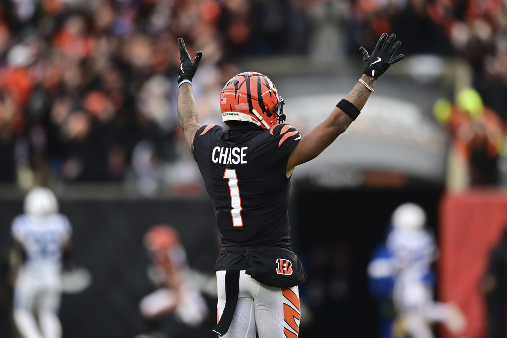 Cincinnati Bengals wide receiver Ja'Marr Chase (1) celebrates a touchdown in the first half during an NFL football game.