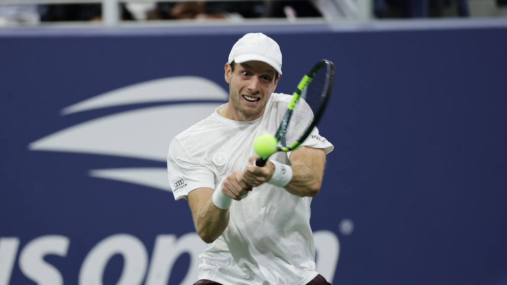Botic van de Zandschulp of the Netherlands hits a shot during the 2026 US Open tennis tournament.