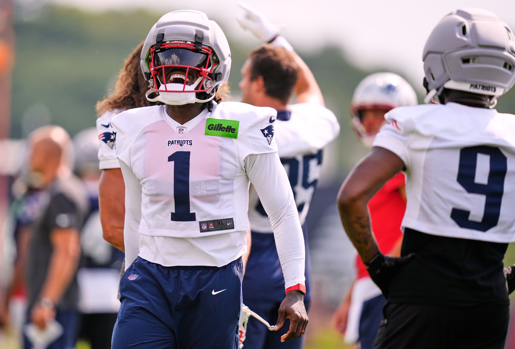 New England Patriots wide receiver A.J. Brown (1) laughs with teammates during the team's NFL football training camp. Brown suffered an injury in the Patriots' season opener on Wednesday, Sept. 9, 2026.