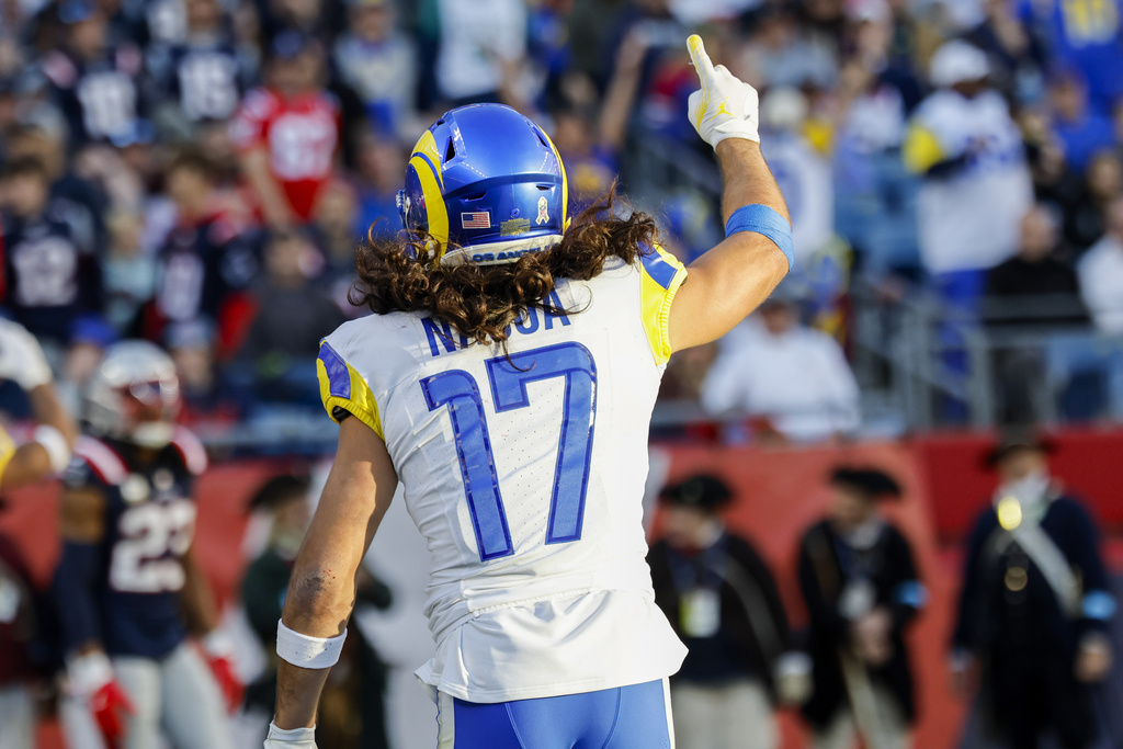 Los Angeles Rams WR Puka Nacua celebrates during an NFL game against the New England Patriots.