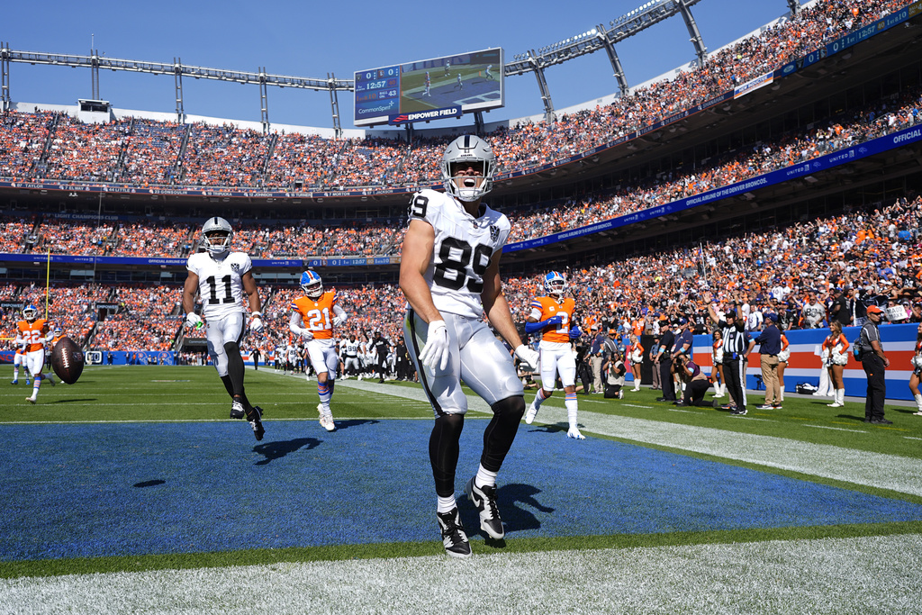 Raiders TE Brock Bowers enters the end zone on a 57-yard catch vs. the Broncos.
