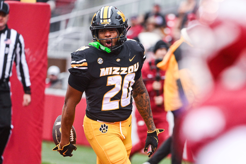 Missouri RB Jamal Roberts celebrates following his rushing TD vs. Arkansas.