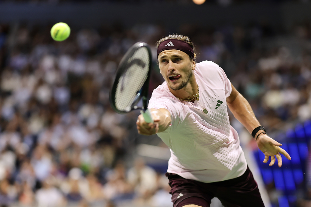 Alexander Zverev of Germany hits a return during the quarterfinals of the 2026 US Open tennis tournament.
