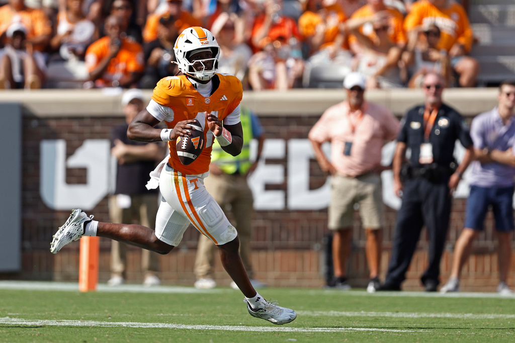 Tennessee QB Faizon Brandon runs during a college football game vs. Furman.