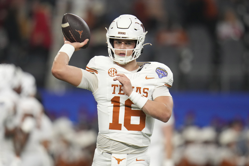 Texas QB Arch Manning warms up before a College Football Playoff game vs. Ohio State.