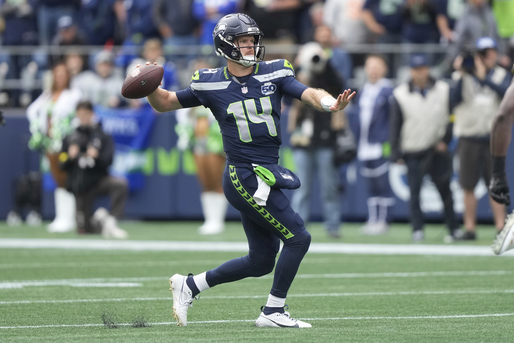 Seattle Seahawks quarterback Sam Darnold (14) passes during the first half of an NFL football game against the New Orleans Saints, Sunday, Sept. 21, 2025, in Seattle.