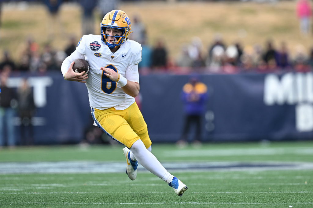 Pittsburgh Panthers QB Mason Heintschel runs during the Military Bowl.