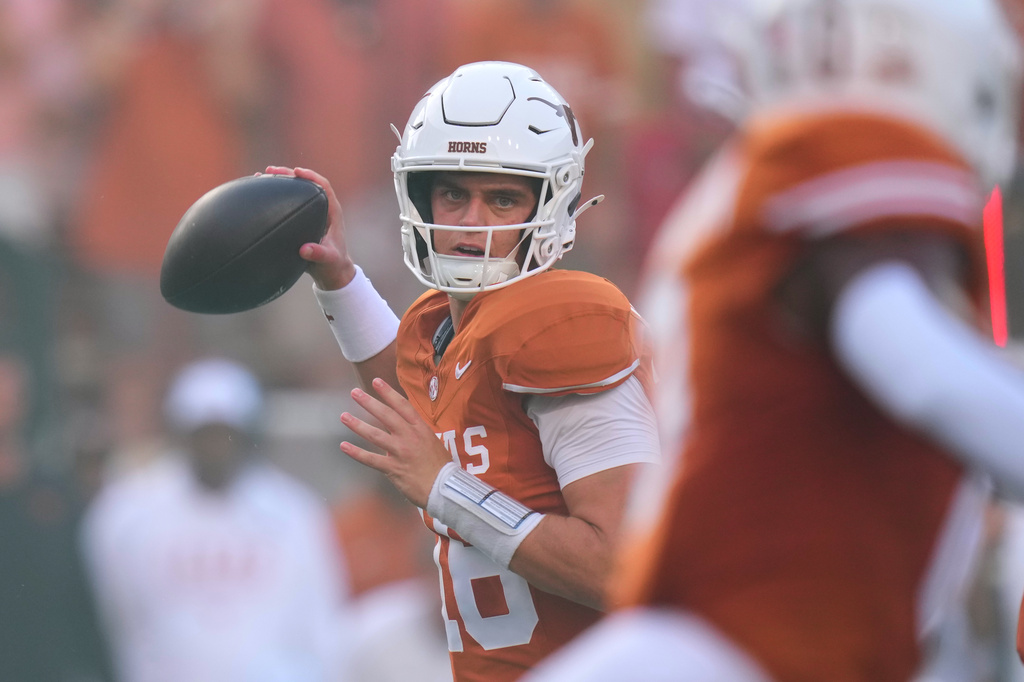 Texas quarterback Arch Manning (16) throws against Ohio State during the first half of an NCAA college football game in Austin, Texas, Saturday, Sept. 12, 2026.