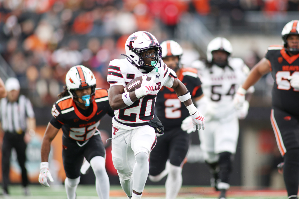 Texas Tech RB J'Koby Williams runs during a college football game vs. Oregon State.