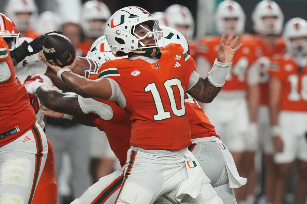 Miami QB Darian Mensah throws a pass during a CFB game against Florida A&M.