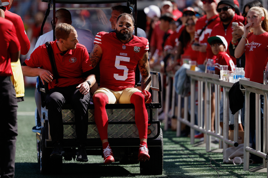 San Francisco 49ers WR Mike Evans is carted off during an NFL game vs. the Arizona Cardinals.