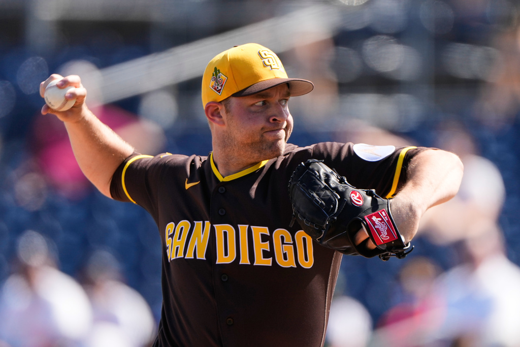 Padres SP Michael King throws during spring training ahead of the 2026 season.