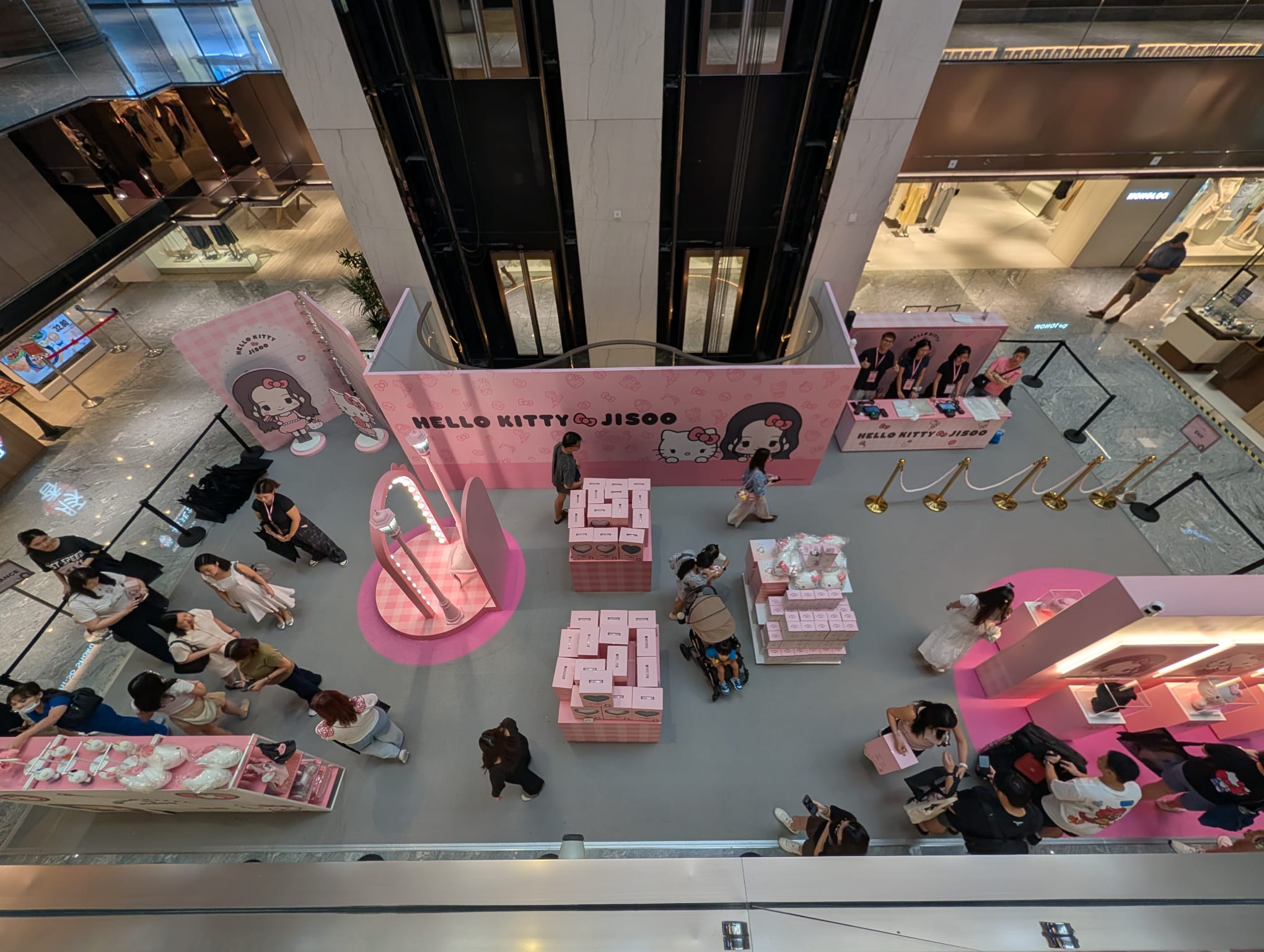 Overhead view of the Hello Kitty x JISOO pop-up booth at Wisma Atria