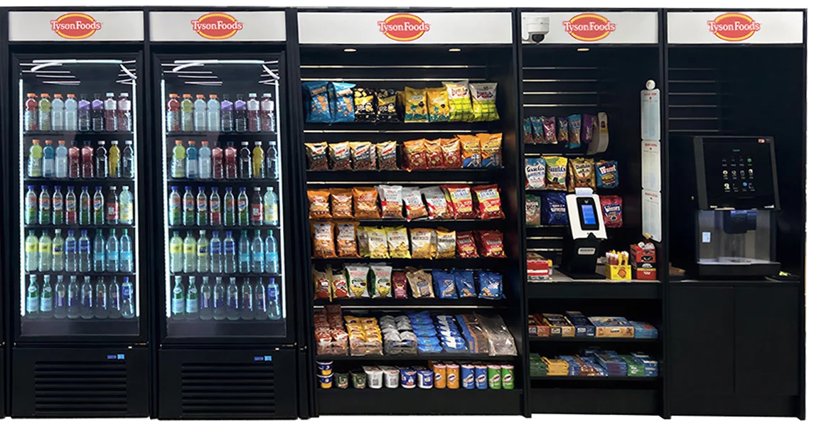 Tyson Foods custom micro market setup example. Containing bottled beverages, various snack packets, an automated checkout kiosk, and a coffee machine.