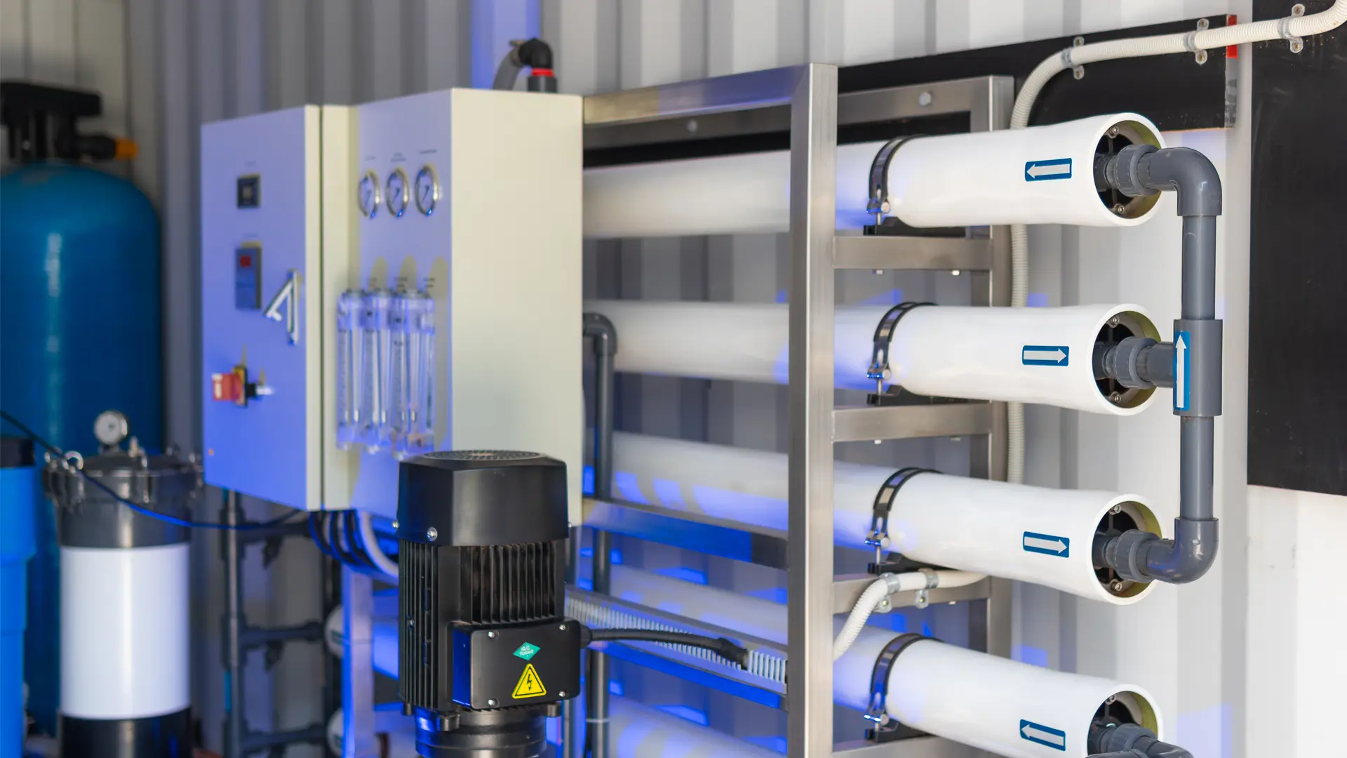 Custom CITOR reverse osmosis system installed in a container, with membrane vessels and control panel