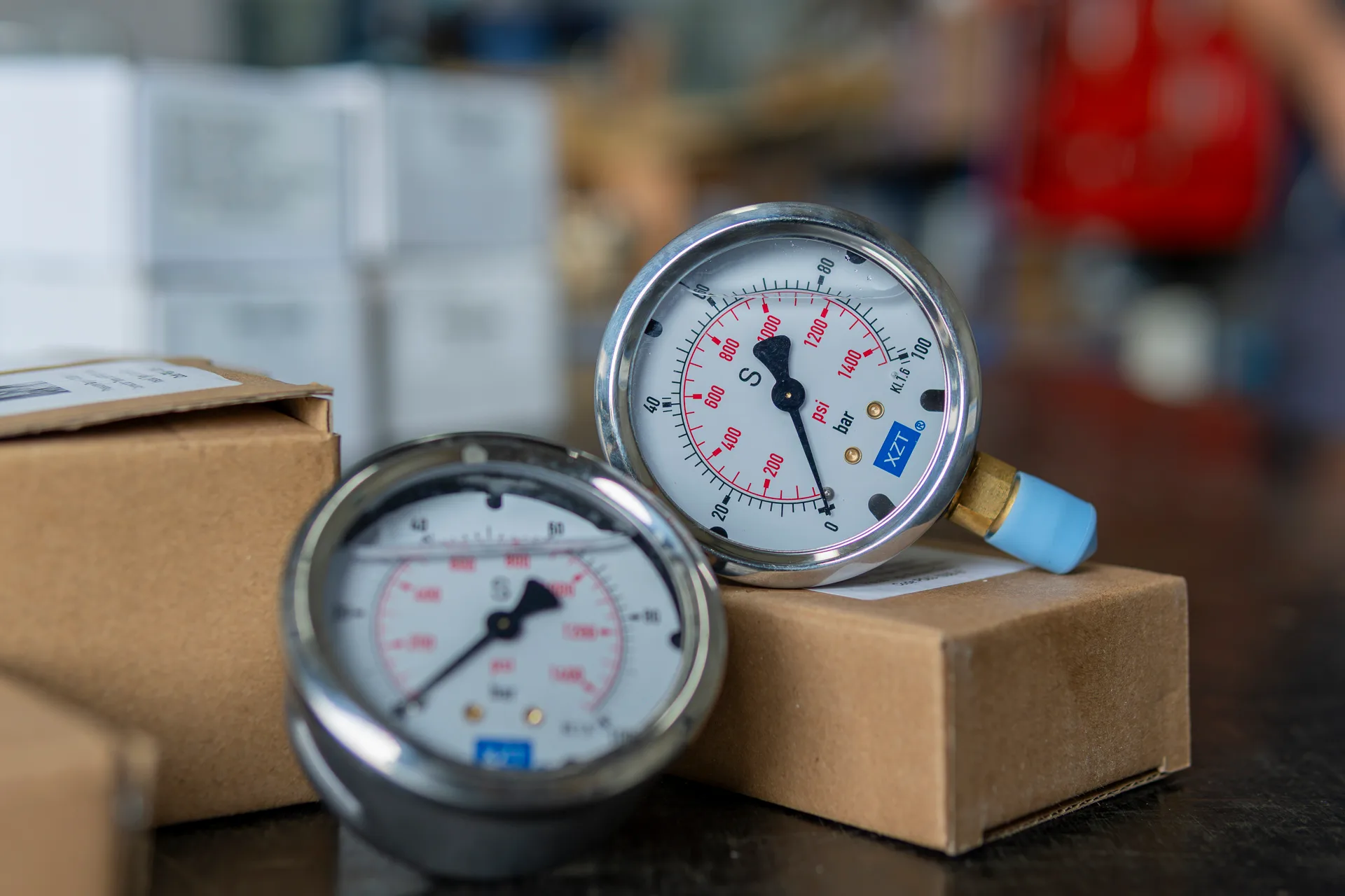 Pressure gauges on a box of CITOR spare parts