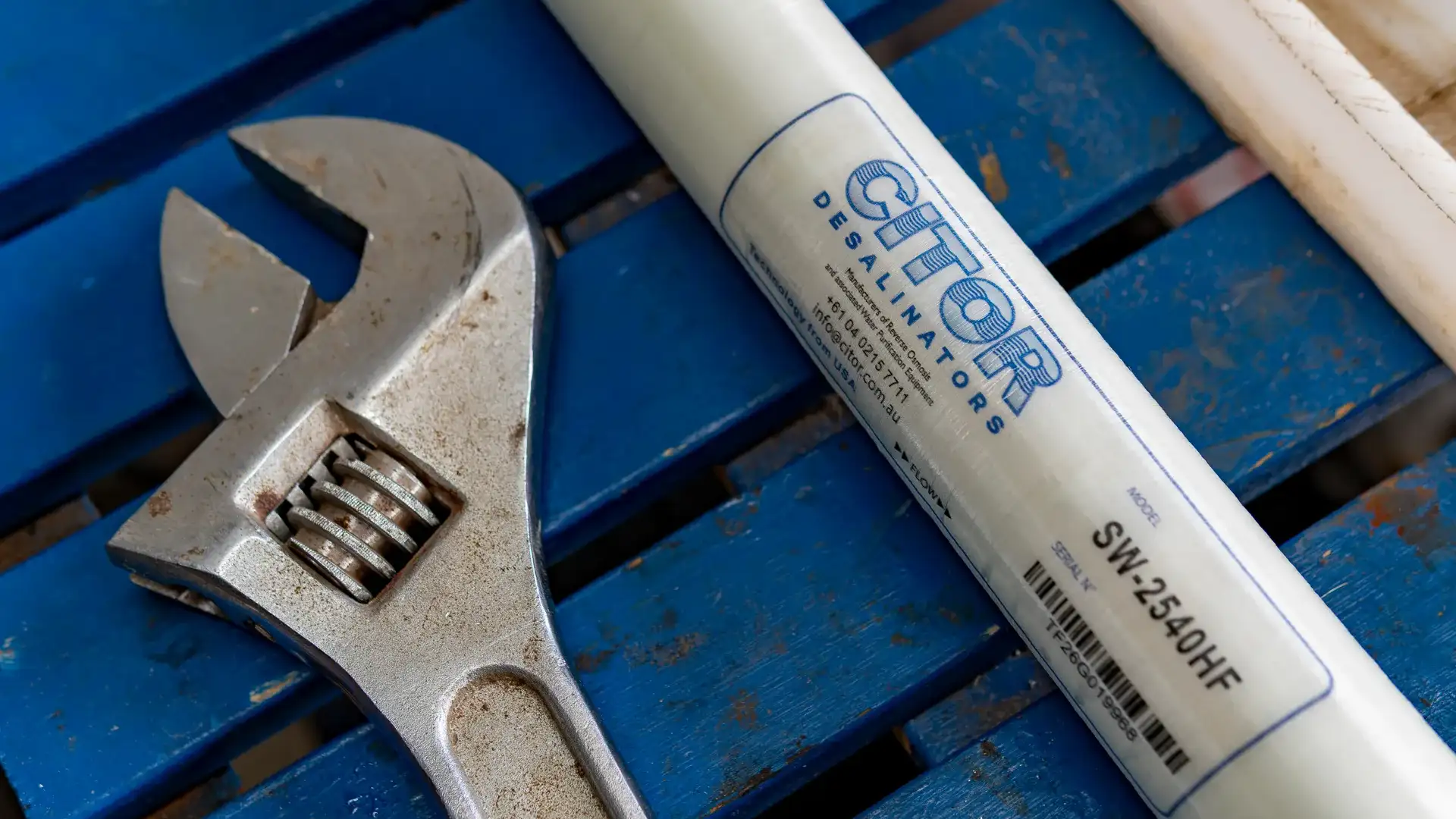 Adjustable spanner beside a CITOR reverse osmosis membrane