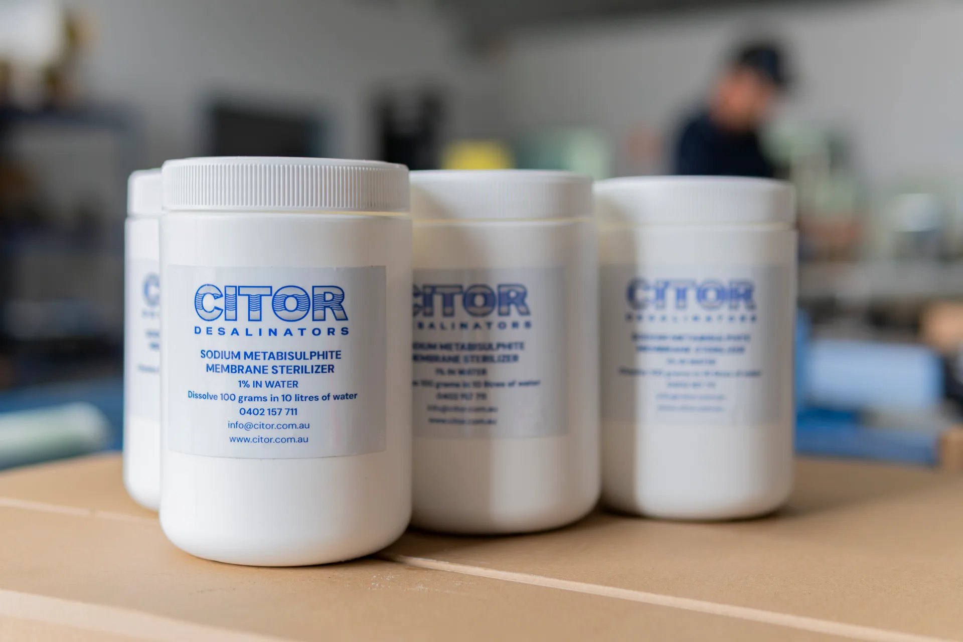 Tubs of CITOR membrane cleaning chemicals