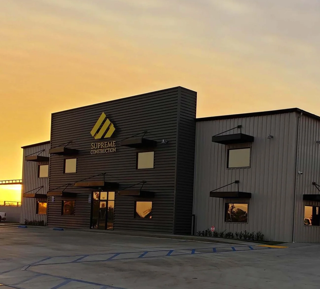 Supreme Construction commercial building exterior at sunset in California.