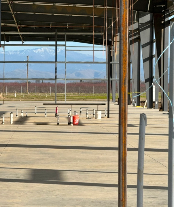 Structural framing phase of a commercial construction project by Supreme Construction.