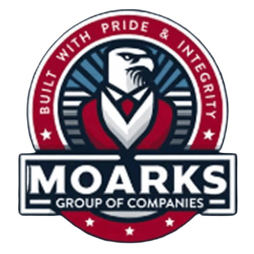 Moarks Group of Companies logo featuring a stylized eagle wearing a suit inside a circular emblem with the phrase 'Built with Pride & Integrity'.