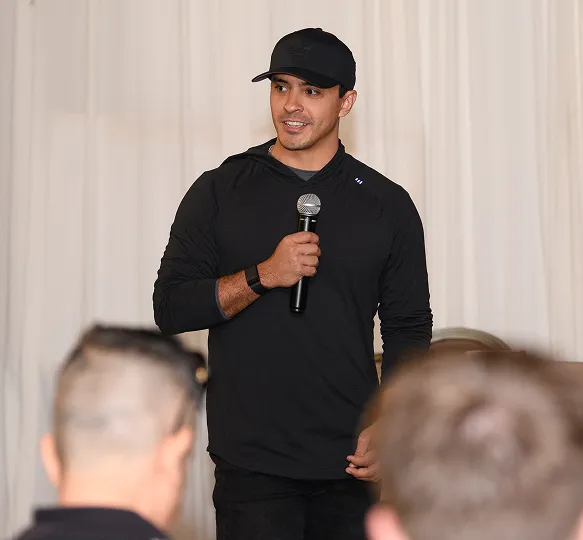 A member speaking on stage