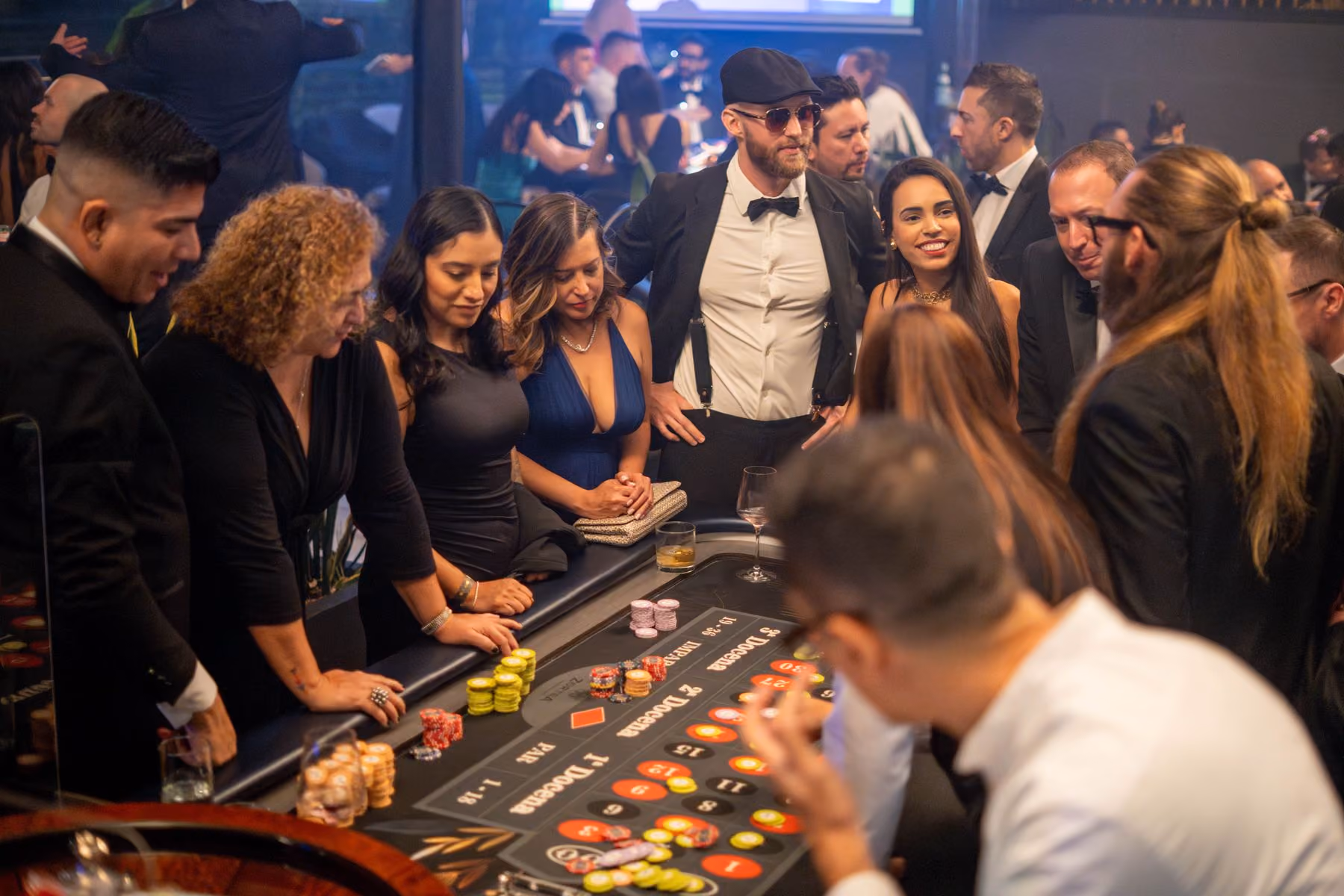 Roulette table crowd at the 2025 charity gala, Medellín