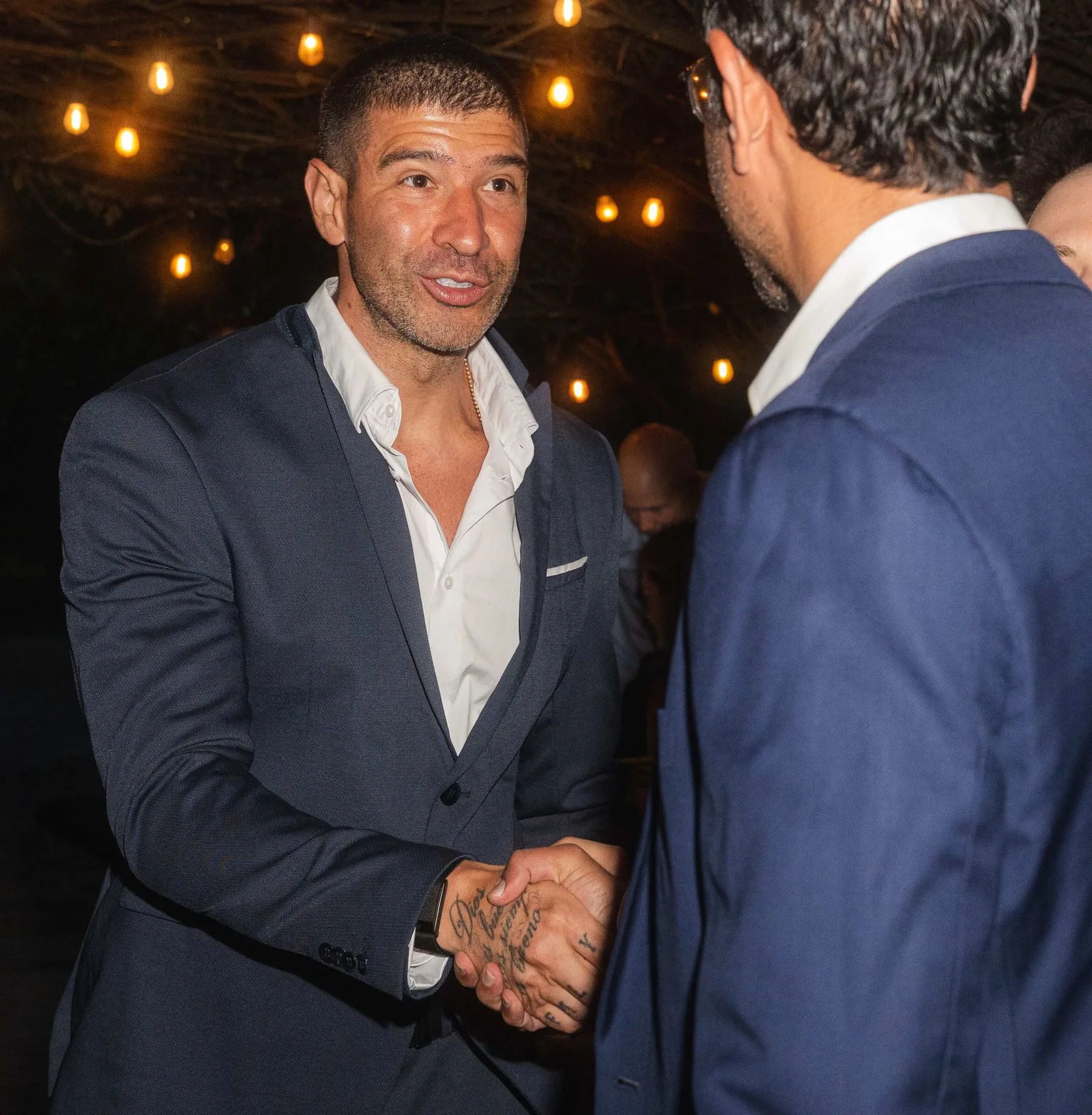 A handshake at a dinner