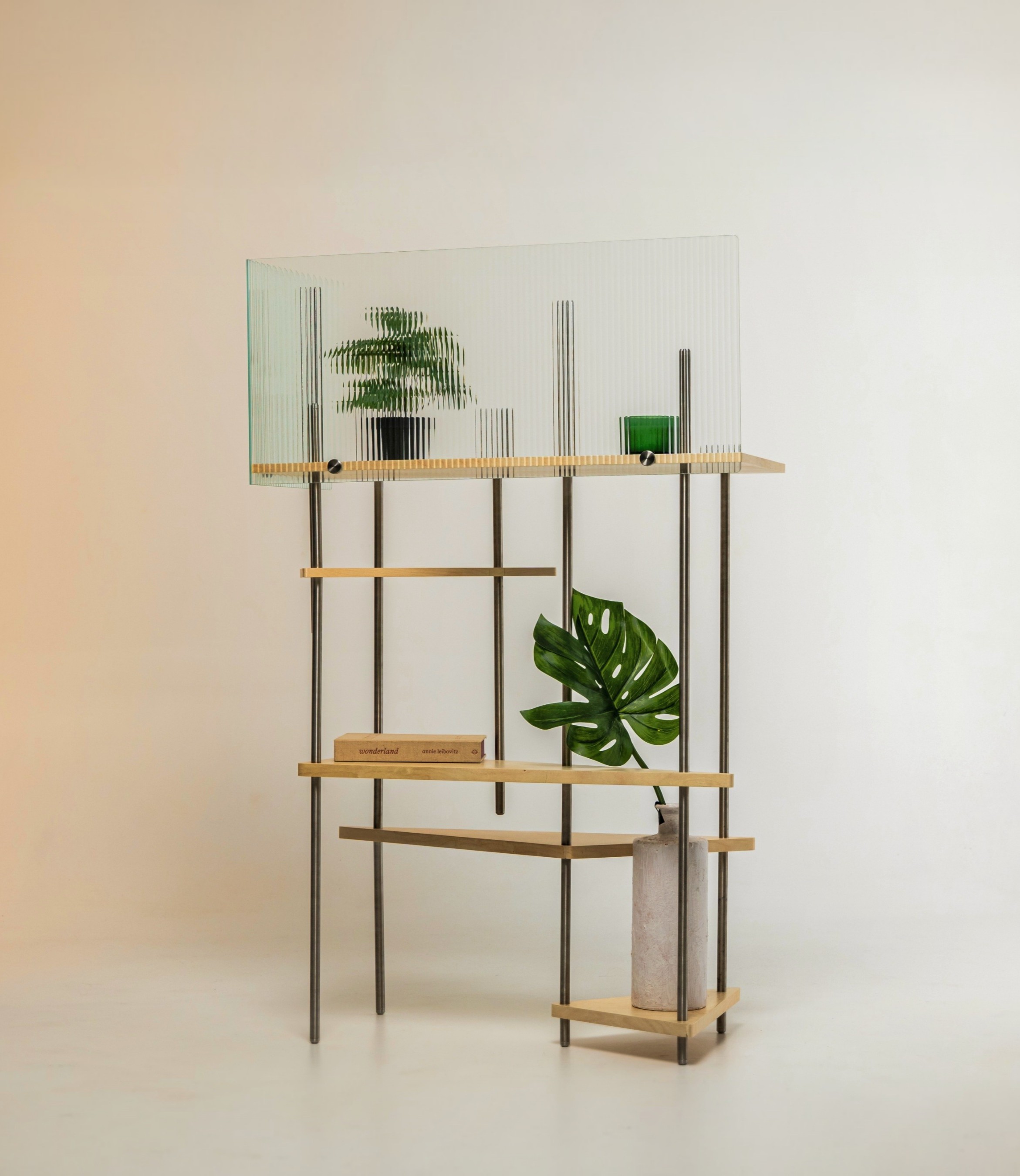 Close-up of whitened plywood and stainless steel joinery on the L05 shelf