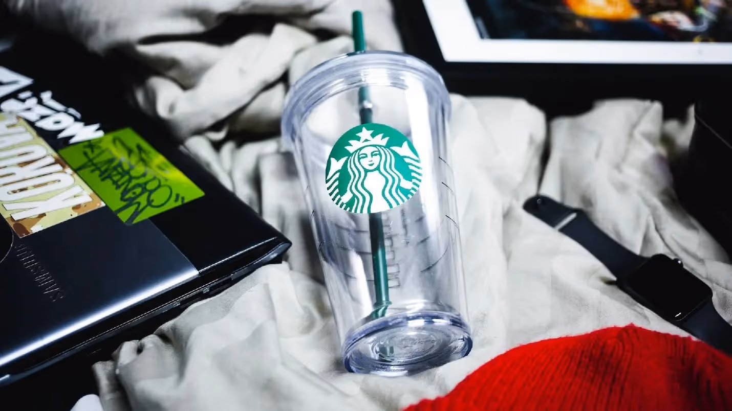 Creative workspace with laptop and design tools used for brand content creation