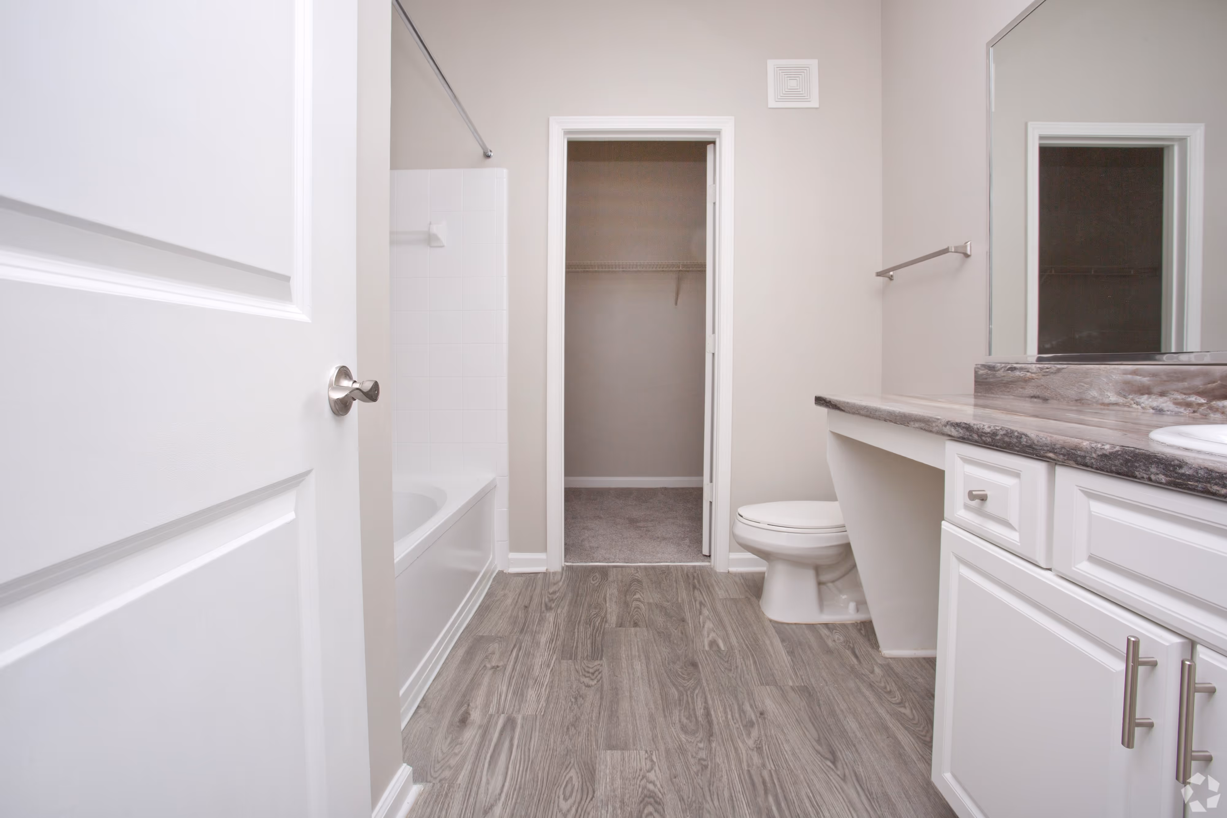 Bathroom with white cabinets